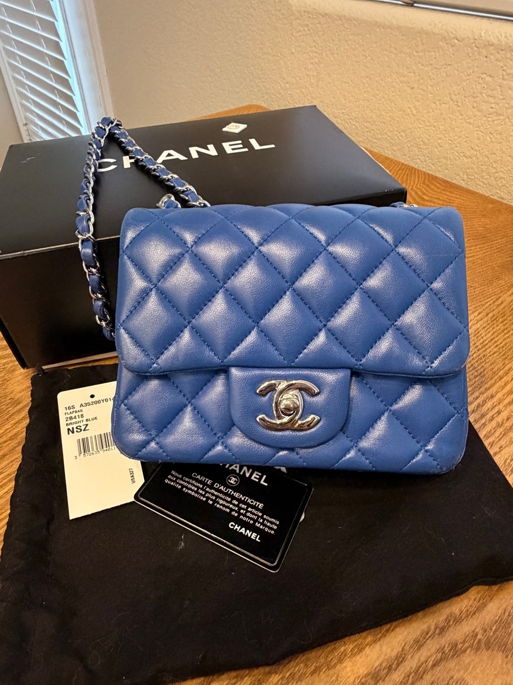 CHANEL square Quilted Lambskin Mini Flap Bag in Bright blue